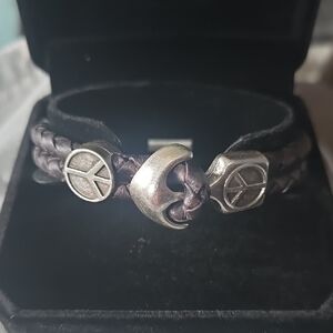 Silver Peace Symbol On Brown Antique Leather Braided Bracelet.